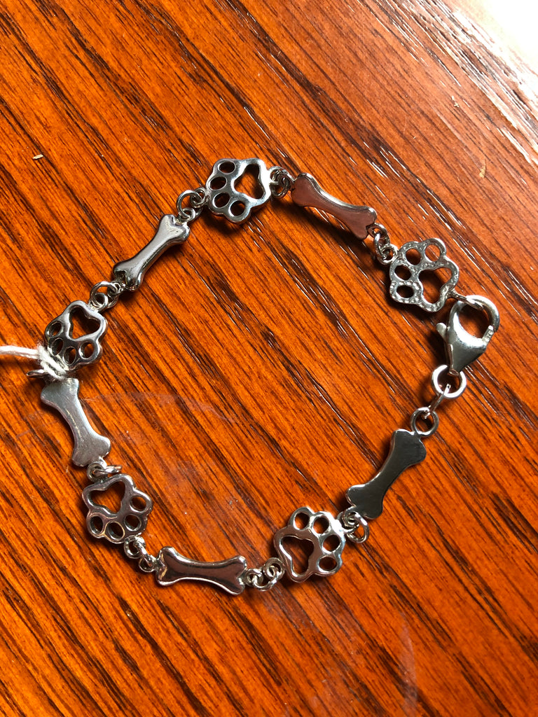 Sterling silver 7.5” open paw print bracelet